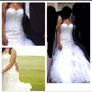 Wedding dress size 14.  120 or best offerThe dress is by: Cara MiaStyle ZELE